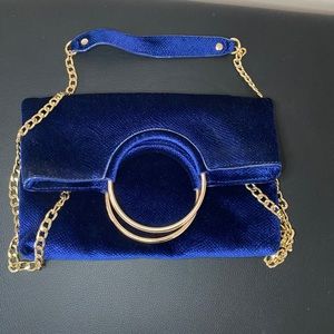 Blue velvet fabric bag with remvable gold chain!